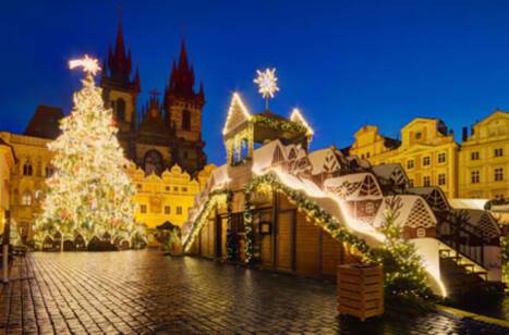 Christmas market at night in the Old Town Square in Prague, Czech Republic