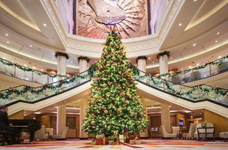 A Christmas tree in the atrium of a Cunard ship