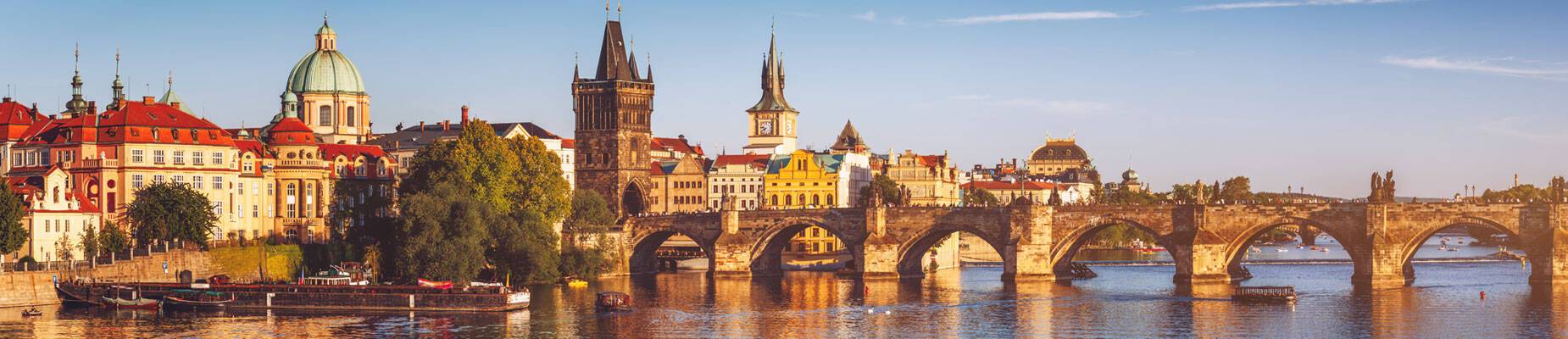 Panoramic image of the Vltava River in Prague, Czech Republic, at sunset