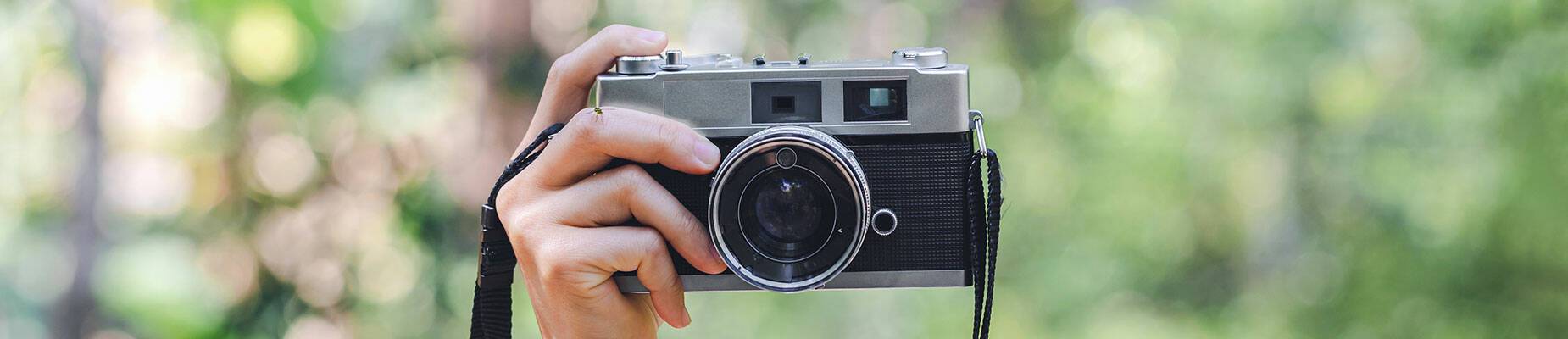 Person holding a camera