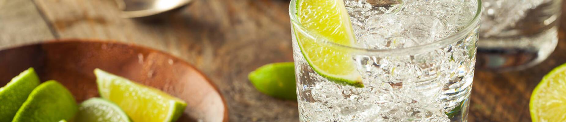 A gin and tonic on a wooden table