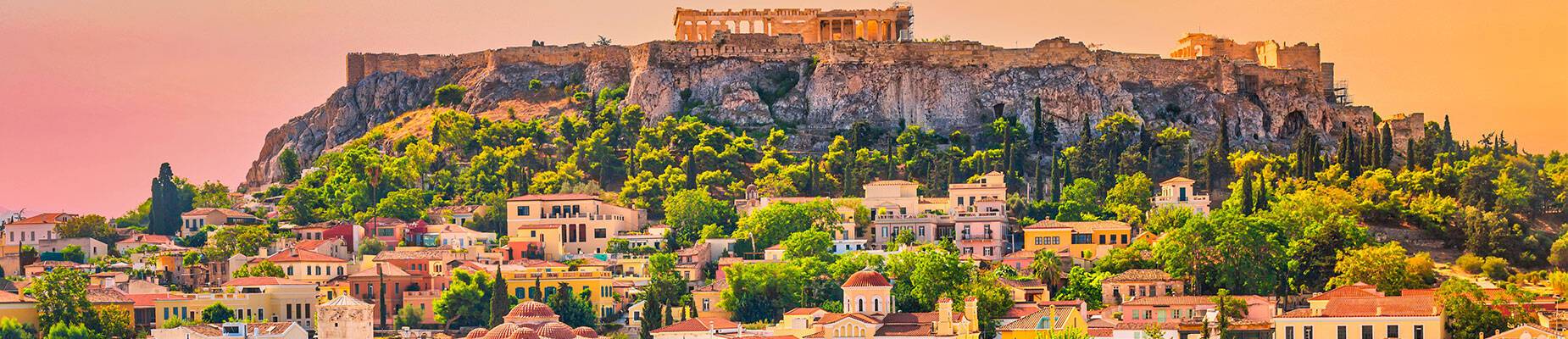 A view of Athens with an overlay image of Sally Gunnell