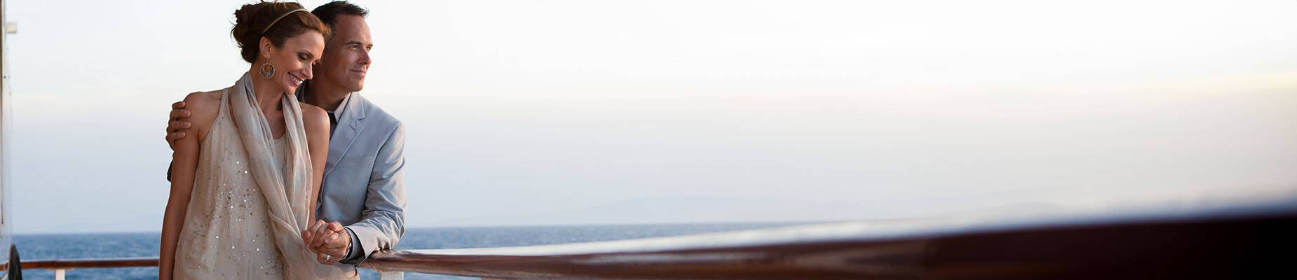 A couple standing on the deck of Seven Seas Explorer