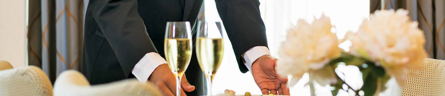 Butler serving canapes