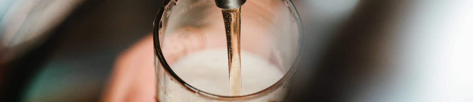 Beer being poured from tap