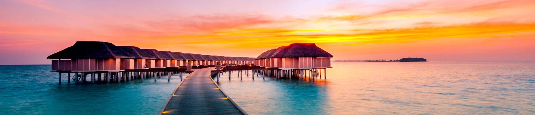 Panoramic image of water villas in the Caribbean
