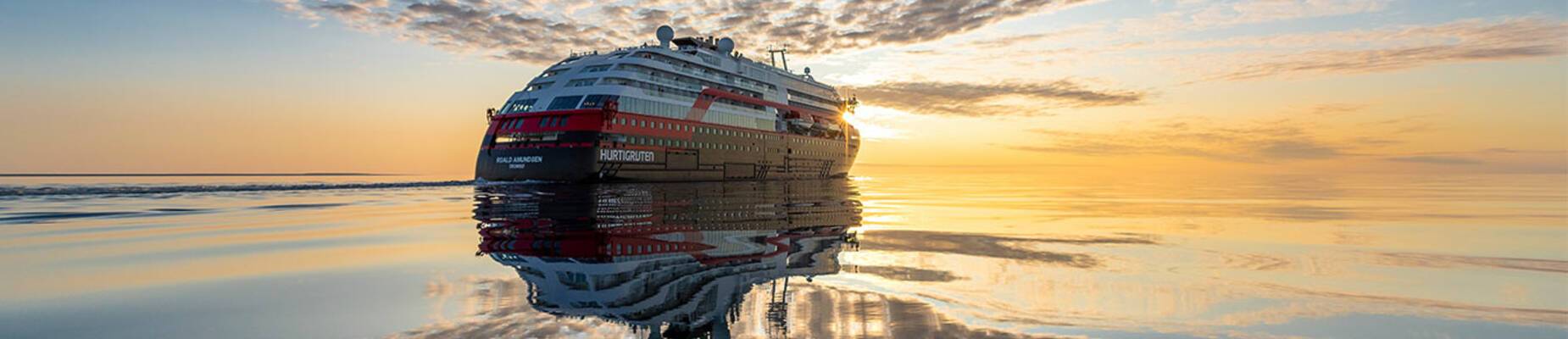 MS Roald Amundsen sailing into the sunset