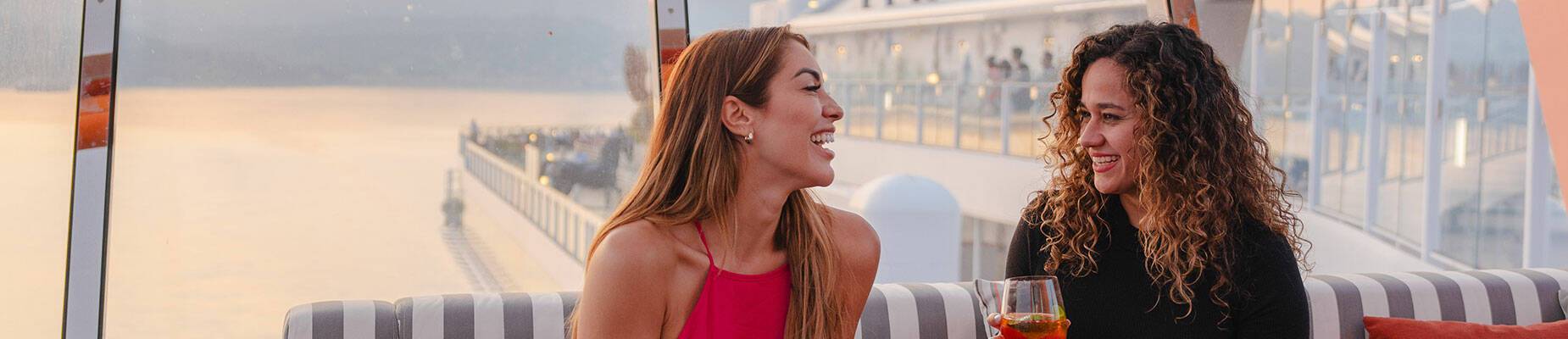 Two friends sitting on the Magic Carpet