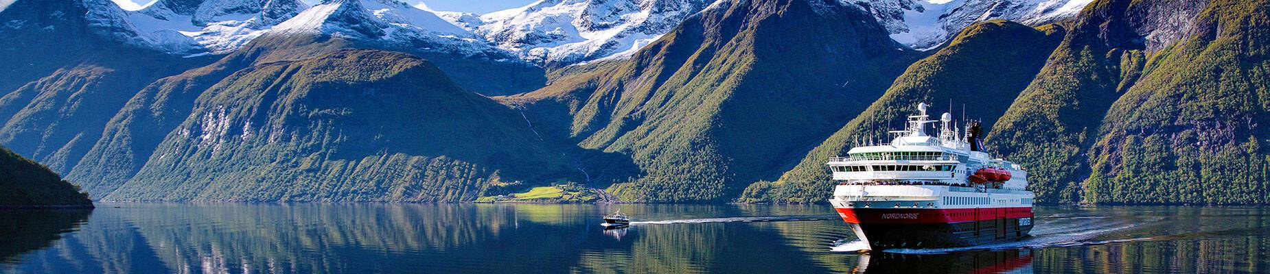 Cruise ship sailing through the Norwegian fjords