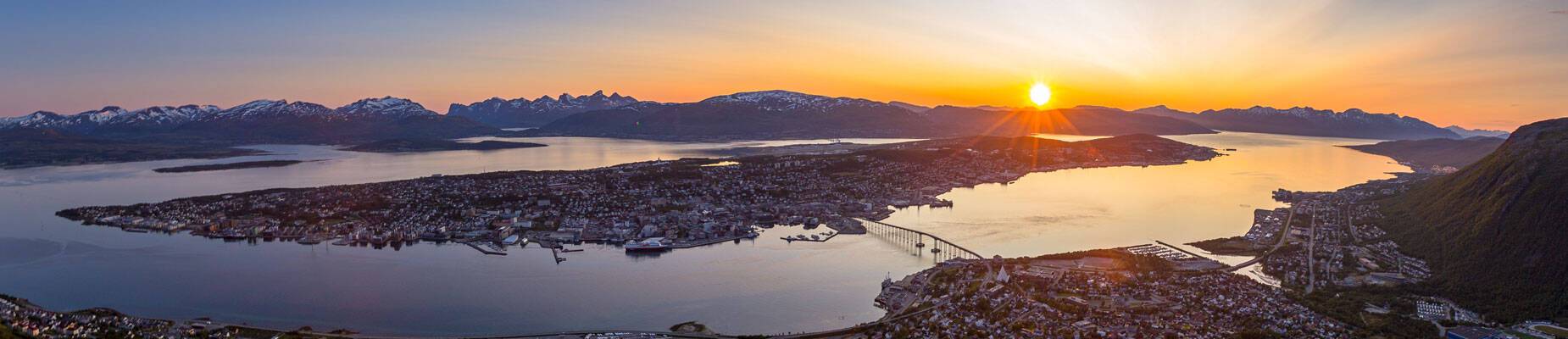 A panoramic image of Tromso, Norway, at sunset
