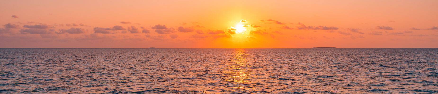 Panoramic image of the sea at sunset