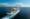 A cruise ship sailing out to sea