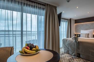 Deluxe Balcony Suite Bedroom (1), MS Geoffrey Chaucer, Riviera Travel