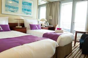 Standard Balcony Bedroom, Ambience, Ambassador Cruise Line