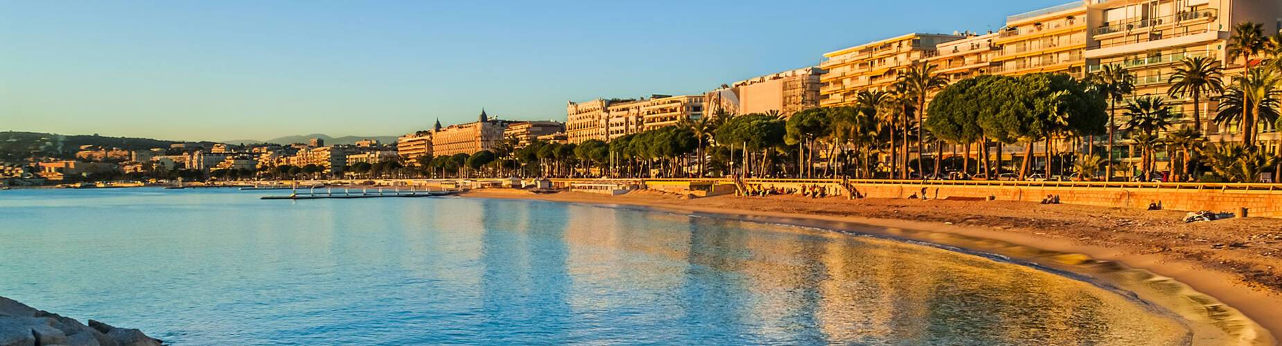 A panoramic view of Cannes at sunset
