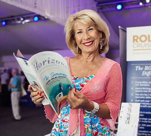 Jennie Bond holding Blue Horizons at the ROL Cruise cruise show